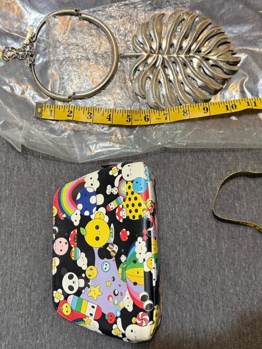 Oscar De La Renta metal Monstera Large Necklace & Alice & Olivia Makeup bag